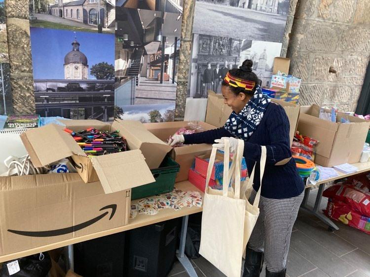 Volunteers helping with fun day packs